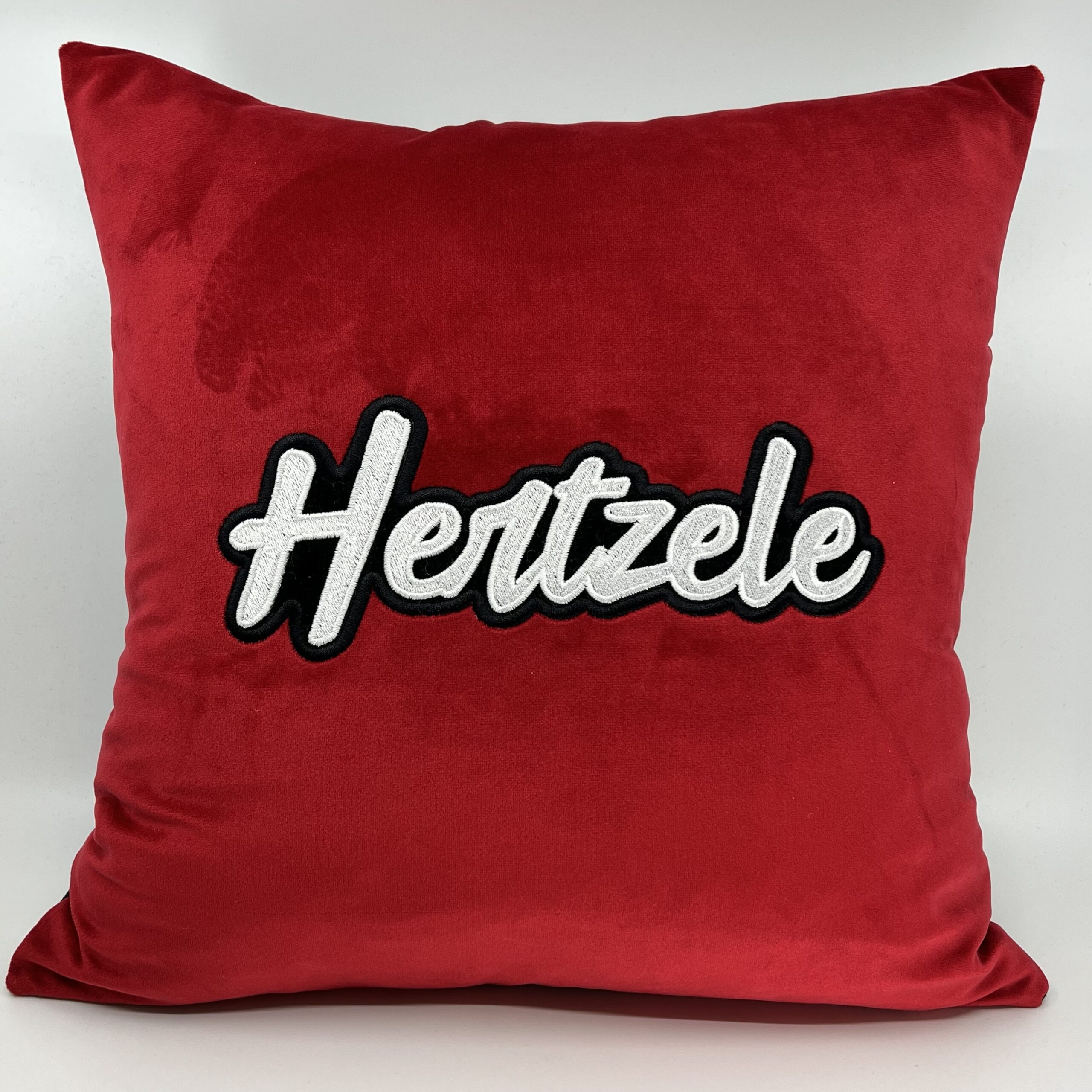 Coussin Hertzele, velours rouge.
